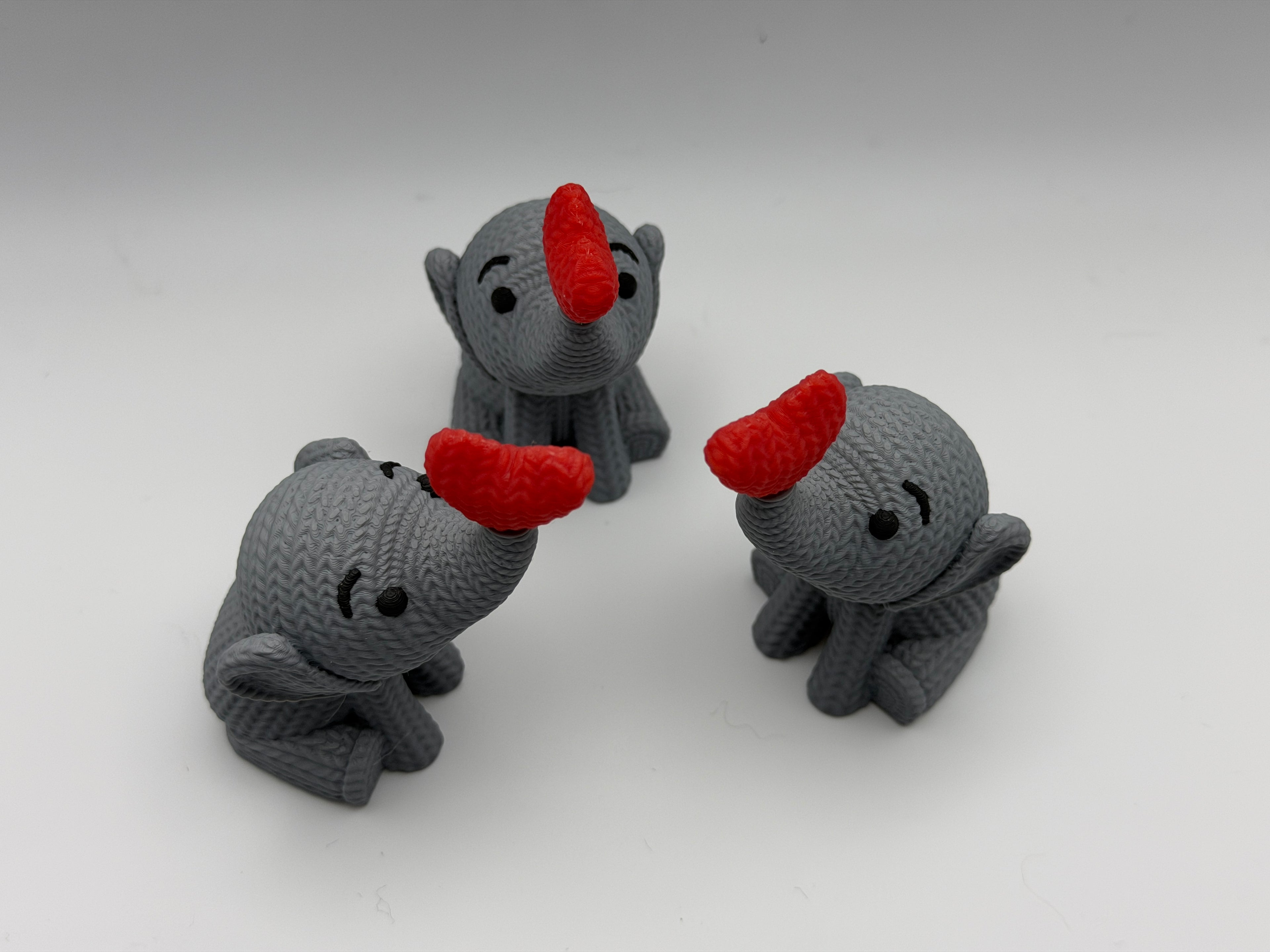 Cute Knitted effect Valentines Elephant sitting with heart on end of trunk